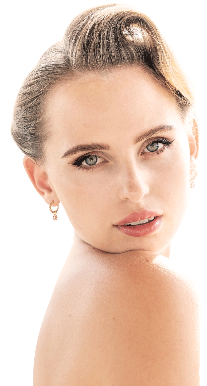 A beautiful women with hair and makeup done.